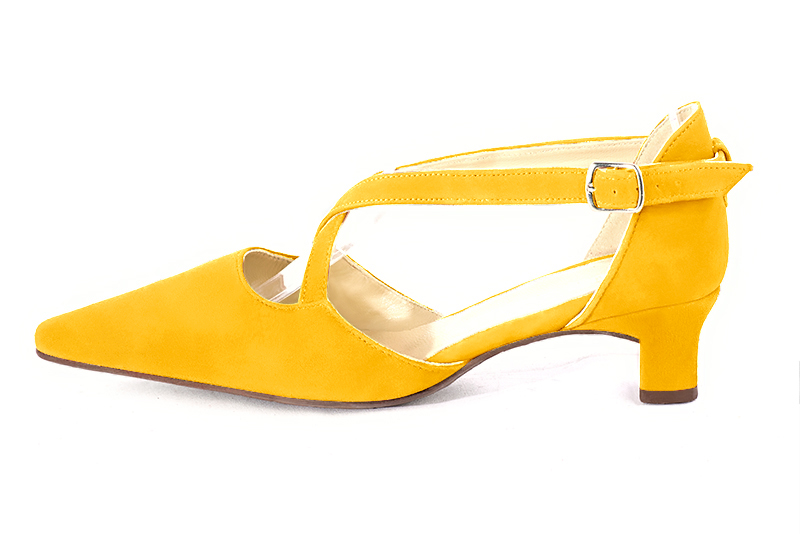 Yellow women's open side shoes, with crossed straps. Tapered toe. Low kitten heels. Profile view - Florence KOOIJMAN